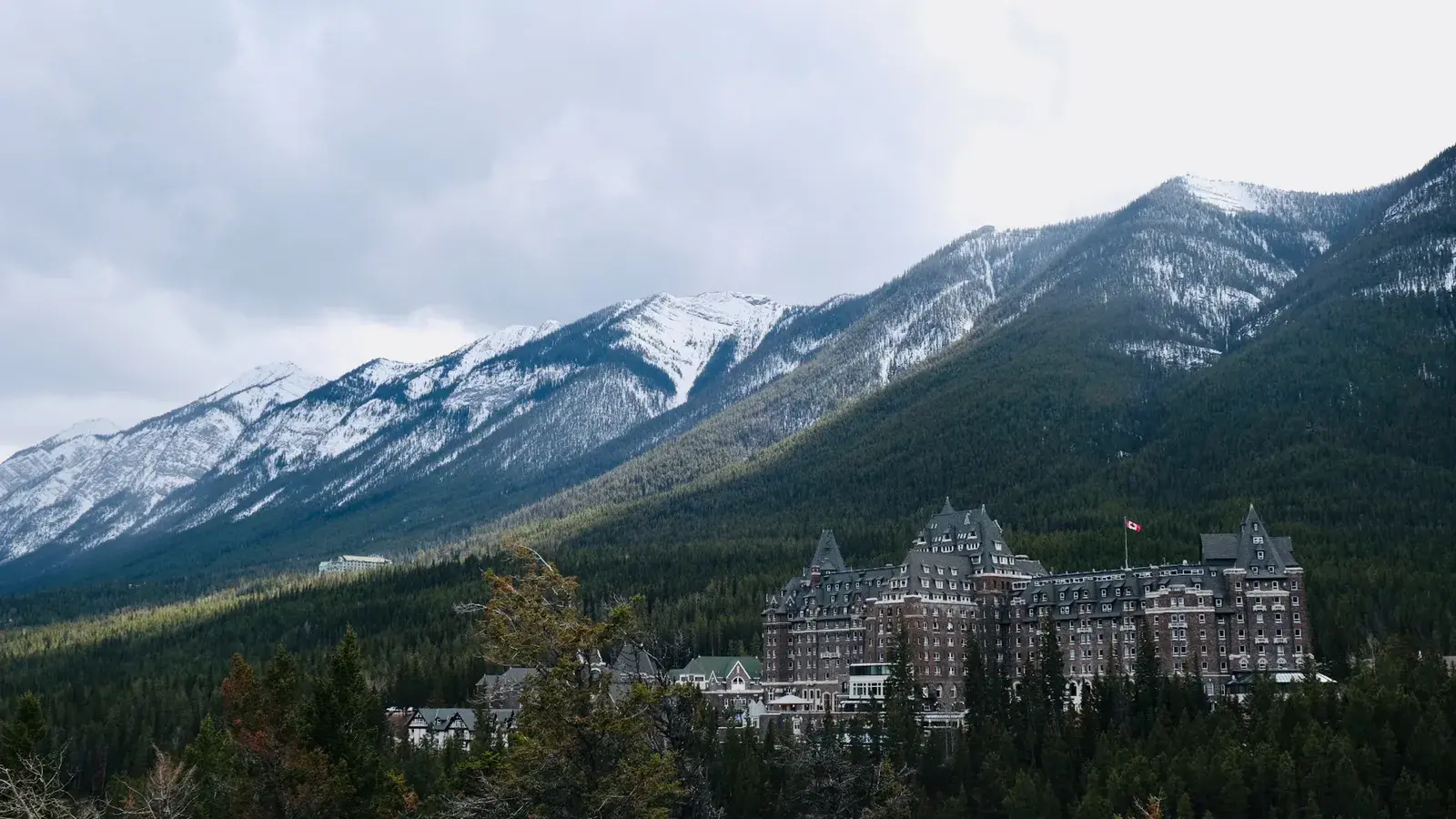 Scenic view of banff springs hotel amidst snow capped 04b7a4